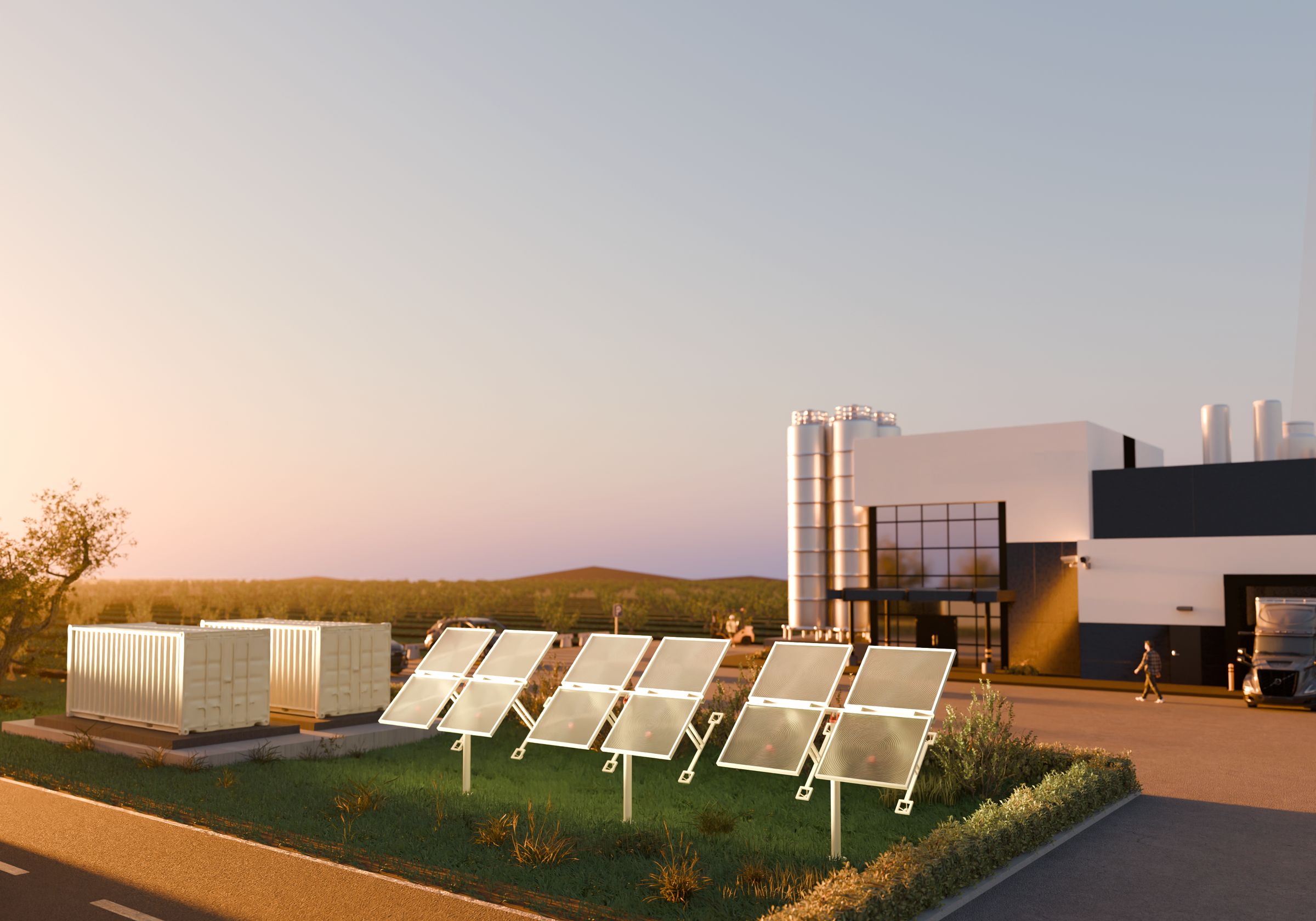 Solstice solar collectors and sand storage containers supplying heat to a factory at sunset